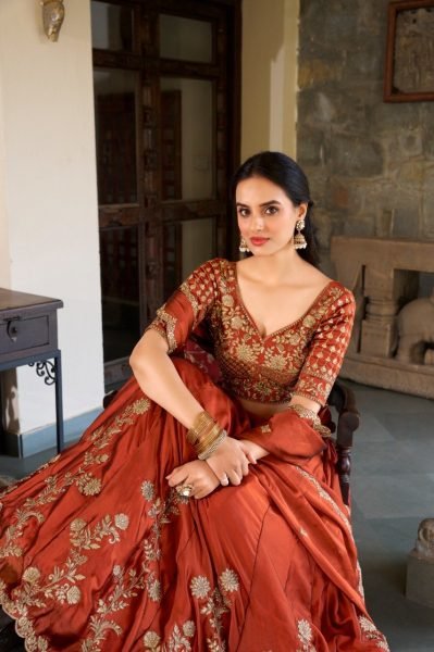 Upscale Rust Orange Rangoli Silk Lehenga Choli With Gold Thread And Sequin Embroidery Designer Lehenga Choli