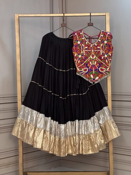 Versatile Black Rayon Lehenga Choli with Lampi Lace and Kutchi Work at Wholesale Rate Navratri Lehnega Choli