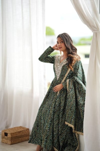 Versatile Mahendi Rayon Mirror Embroidery Gown With Pant And Golden Lace Dupatta For Reseller Opportunity Ready To Wear Collection