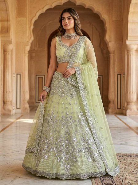 Versatile Pista Designer Lehenga Set with Intricate Mirror and Floral Embroidery Designer Lehenga Choli