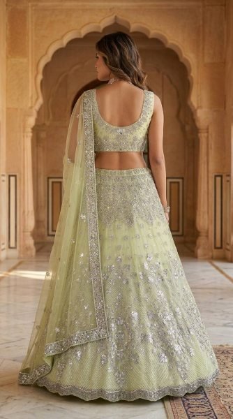 Versatile Pista Designer Lehenga Set with Intricate Mirror and Floral Embroidery Designer Lehenga Choli