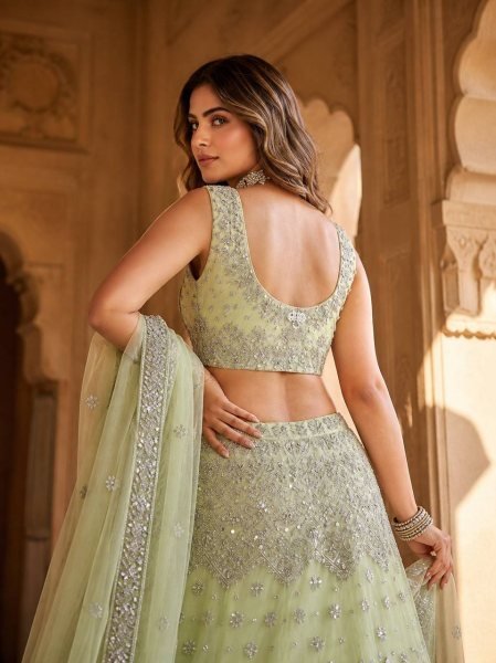 Versatile Pista Designer Lehenga Set with Intricate Mirror and Floral Embroidery Designer Lehenga Choli