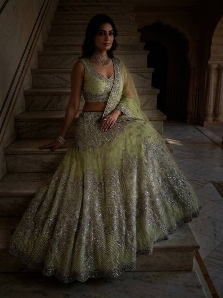 Versatile Pista Designer Lehenga Set with Intricate Mirror and Floral Embroidery Designer Lehenga Choli