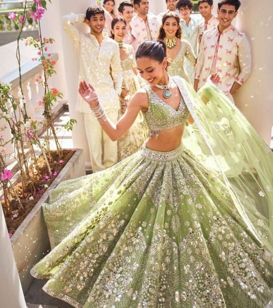 Versatile Pista Designer Lehenga Set with Intricate Mirror and Floral Embroidery Designer Lehenga Choli