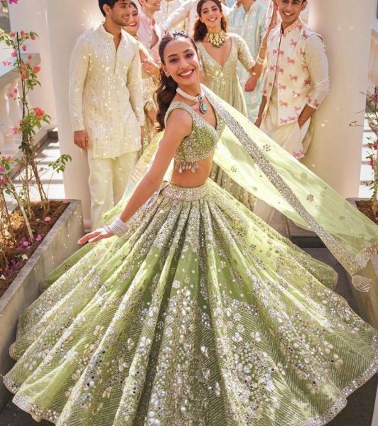 Versatile Pista Designer Lehenga Set with Intricate Mirror and Floral Embroidery Designer Lehenga Choli