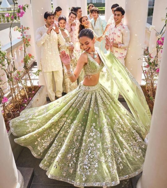 Versatile Pista Designer Lehenga Set with Intricate Mirror and Floral Embroidery Designer Lehenga Choli