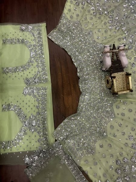 Versatile Pista Designer Lehenga Set with Intricate Mirror and Floral Embroidery Designer Lehenga Choli