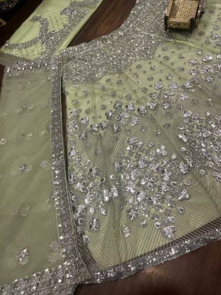 Versatile Pista Designer Lehenga Set with Intricate Mirror and Floral Embroidery Designer Lehenga Choli