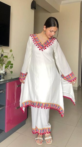 White Faux Georgette Coord Set with Pom Pom Lace Border Perfect for Festive Wear Kurti With Bottom Wholesale