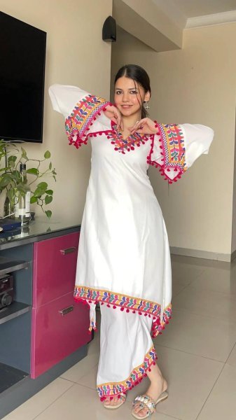 White Faux Georgette Coord Set with Pom Pom Lace Border Perfect for Festive Wear Kurti With Bottom Wholesale