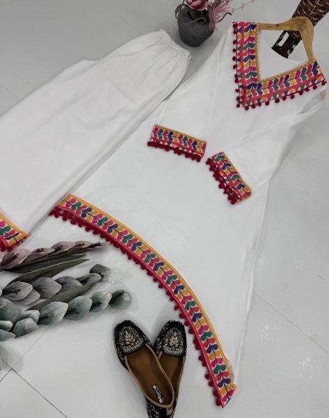 White Faux Georgette Coord Set with Pom Pom Lace Border Perfect for Festive Wear Kurti With Bottom Wholesale