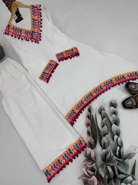 White Faux Georgette Coord Set with Pom Pom Lace Border Perfect for Festive Wear Kurti With Bottom Wholesale