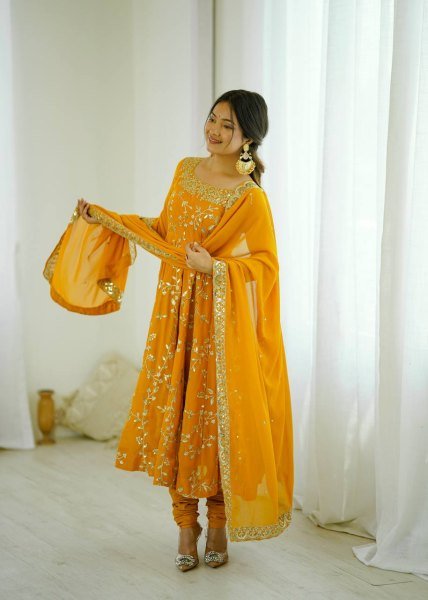 Yellow Faux Georgette Embroidery and Sequence Work Gown with Churidar for Weddings Ready To Wear Collection